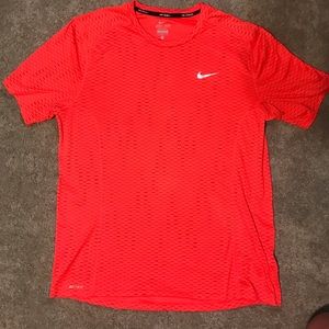 Orange Nike shirt